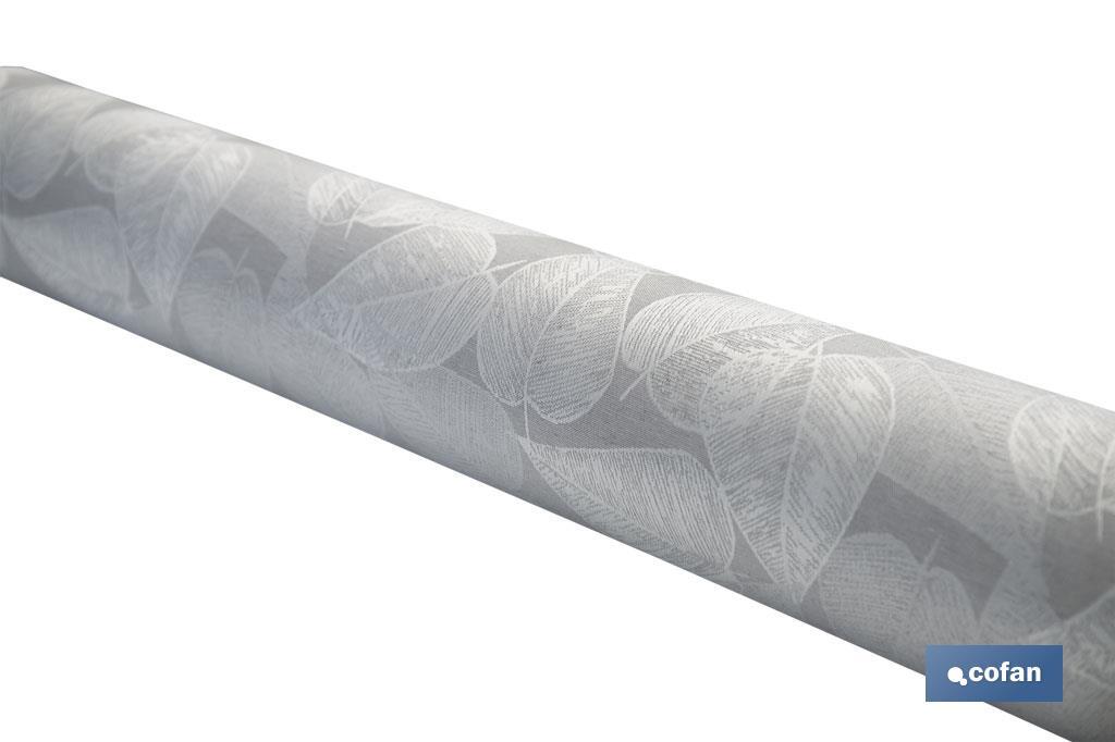 Mantel resinado antimanchas | Diseño moderno con hojas | Color: gris y blanco | Materiales: algodón y poliéster | Disponible en